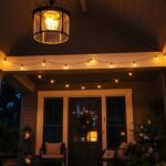 Beautiful porch with multiple lighting elements including pendant lights, string lights, and lanterns creating a warm, inviting atmosphere at dusk
