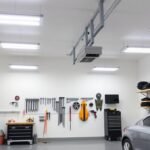 Bright, well-lit garage workshop with overhead LED lighting and task lighting at workbench