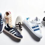 Vintage and modern Adidas shoes showing the evolution of the brand's iconic three stripes design