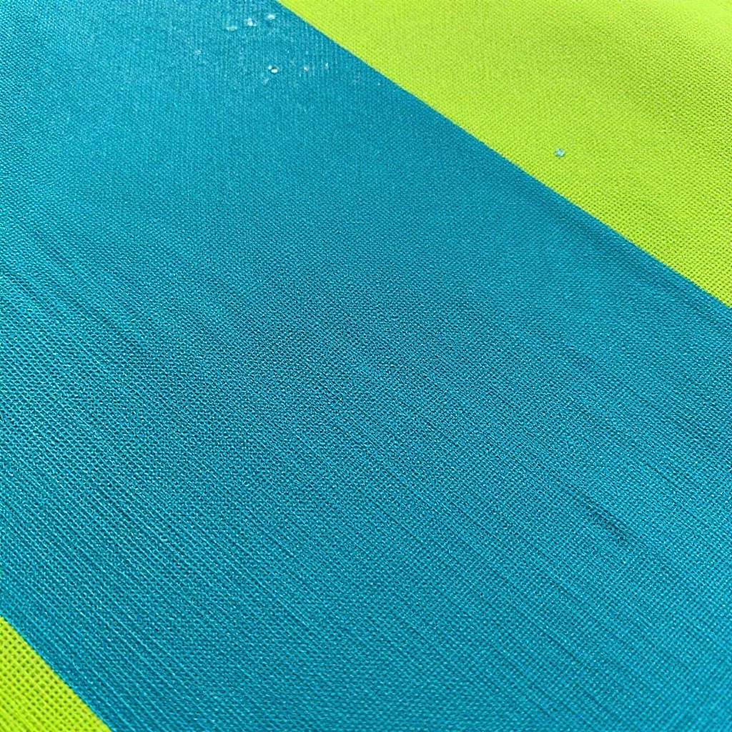 Close-up of marine-grade fabric showing water beading on the surface