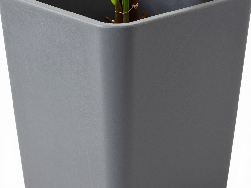 Close-up of a weather-resistant tall planter showing drainage features and durable construction Close-up of a weather-resistant tall planter showing drainage features and durable construction