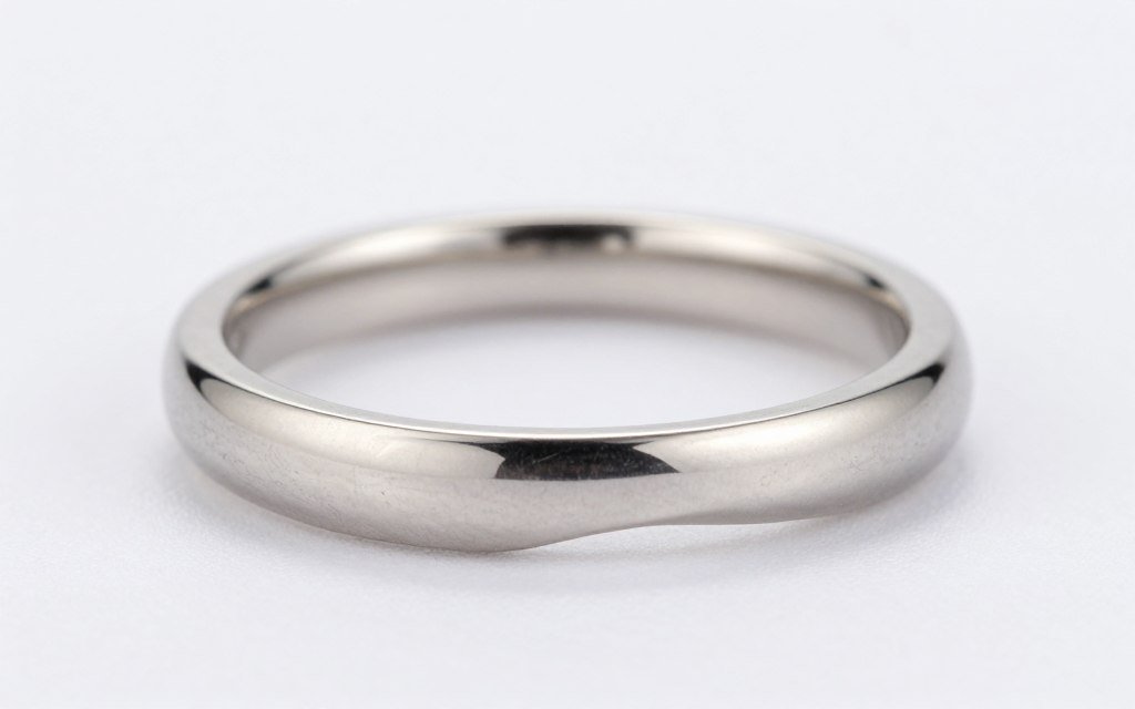 Contoured wedding band fitting around engagement ring Contoured wedding band fitting around engagement ring