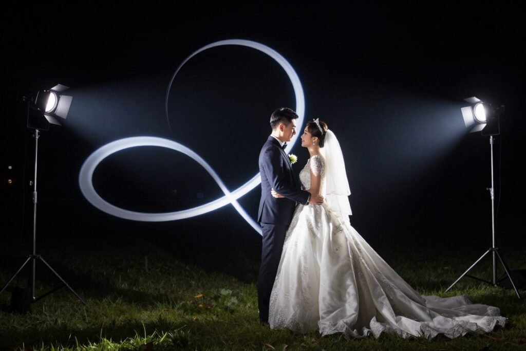 Couple dramatically lit at night with creative lighting
