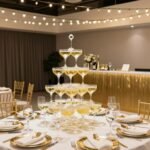 Elegant engagement party with champagne theme featuring gold decorations and bubbly bar
