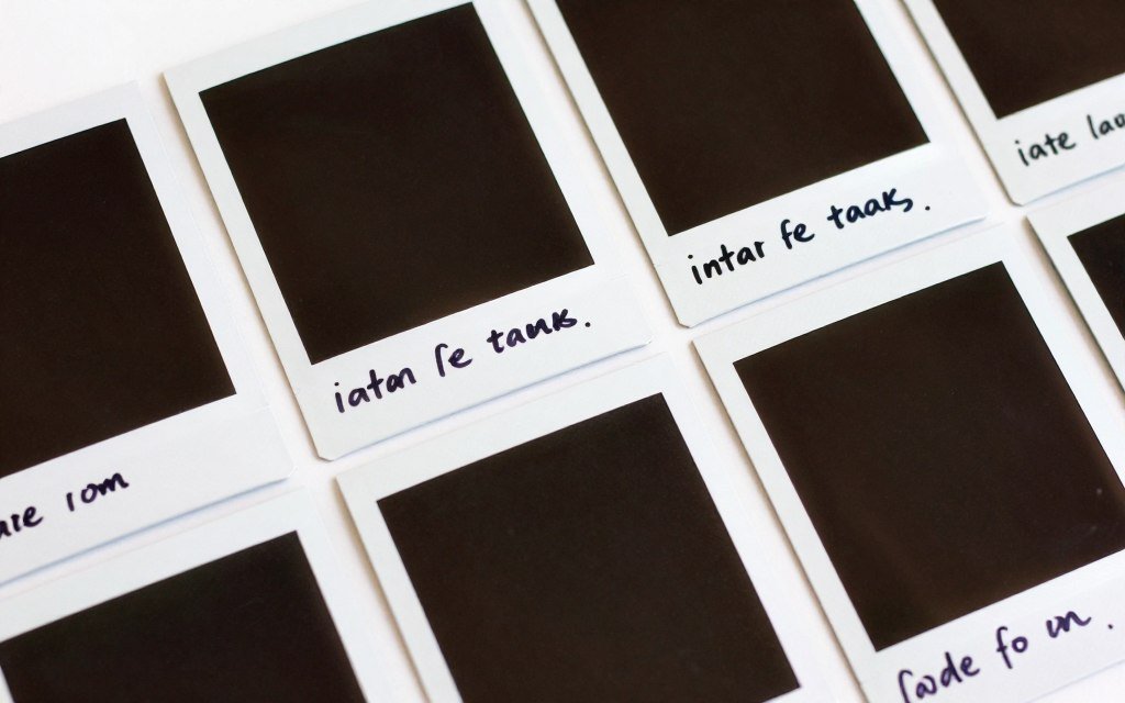 Polaroid pictures with written dates and captions on borders Polaroid pictures with written dates and captions on borders