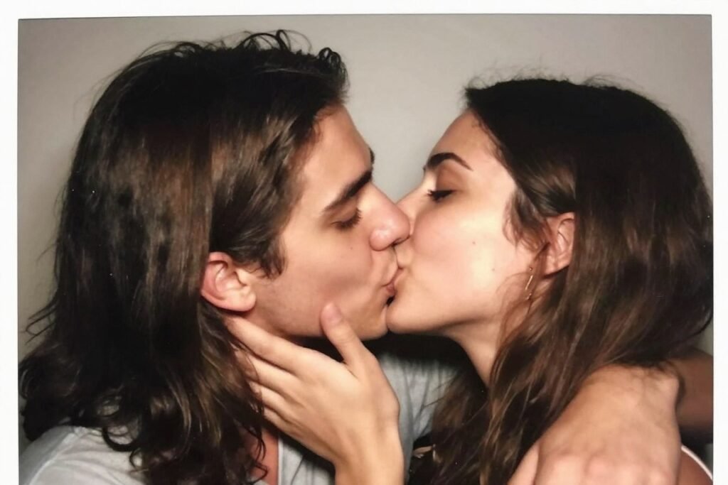 couple kissing naturally in unposed candid photobooth moment