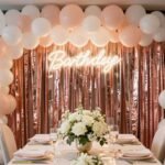 elegant bachelorette party decorations with balloon arch and rose gold accents
