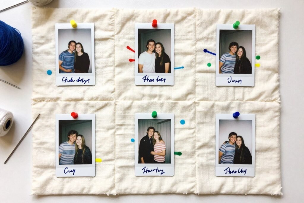 fabric quilt squares with polaroid photos attached and guest signatures written on fabric in various colors fabric quilt squares with polaroid photos attached and guest signatures written on fabric in various colors