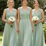garden party bridesmaid dress flowing chiffon in sage green outdoor setting