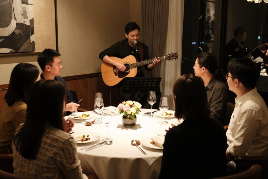 live acoustic musician performing at intimate rehearsal dinner live acoustic musician performing at intimate rehearsal dinner