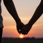 small proposal ideas with couple holding hands at sunset