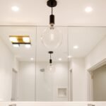 modern bathroom lighting ideas with vanity lights and ambient fixtures